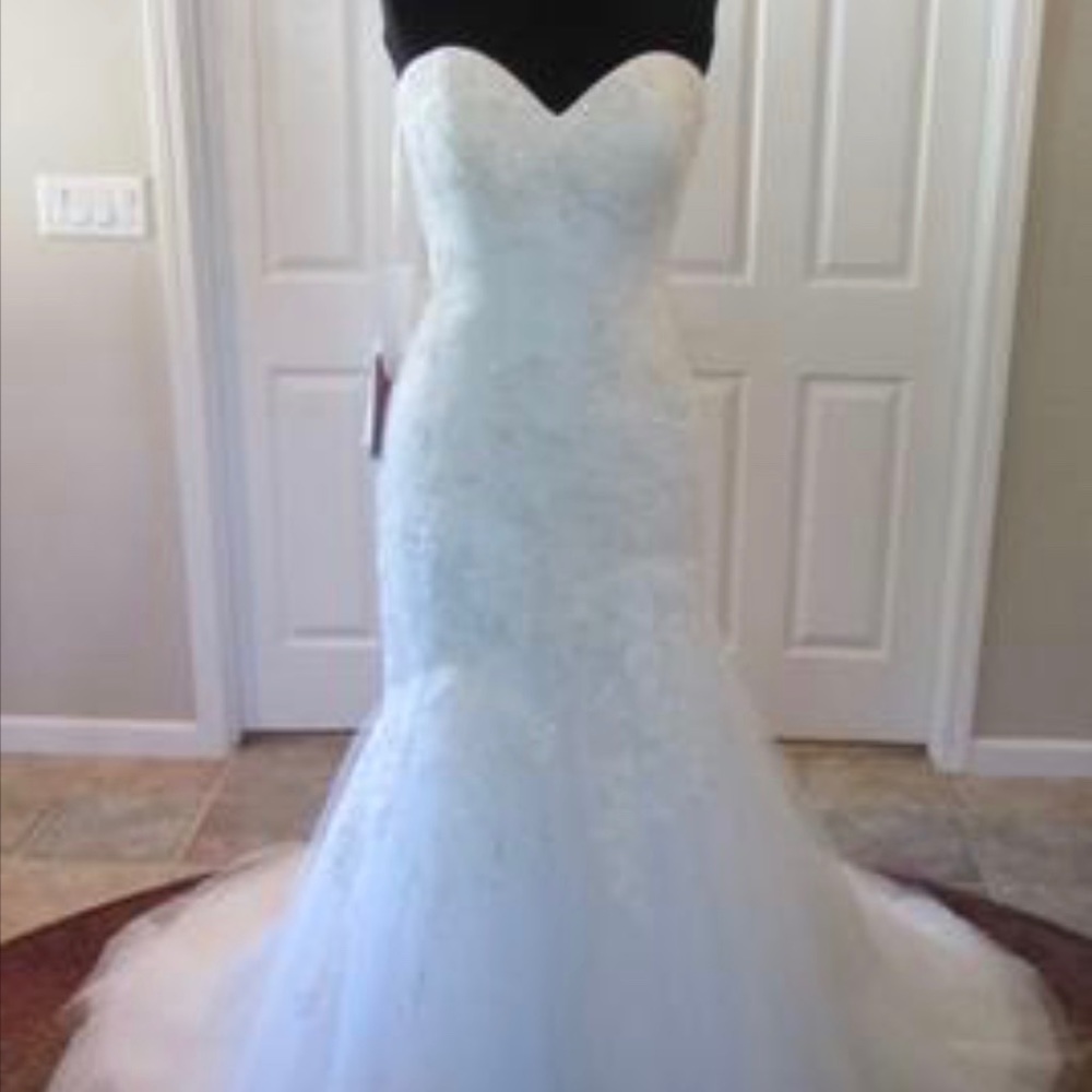 Wedding Dress by Casablanca. free belt added